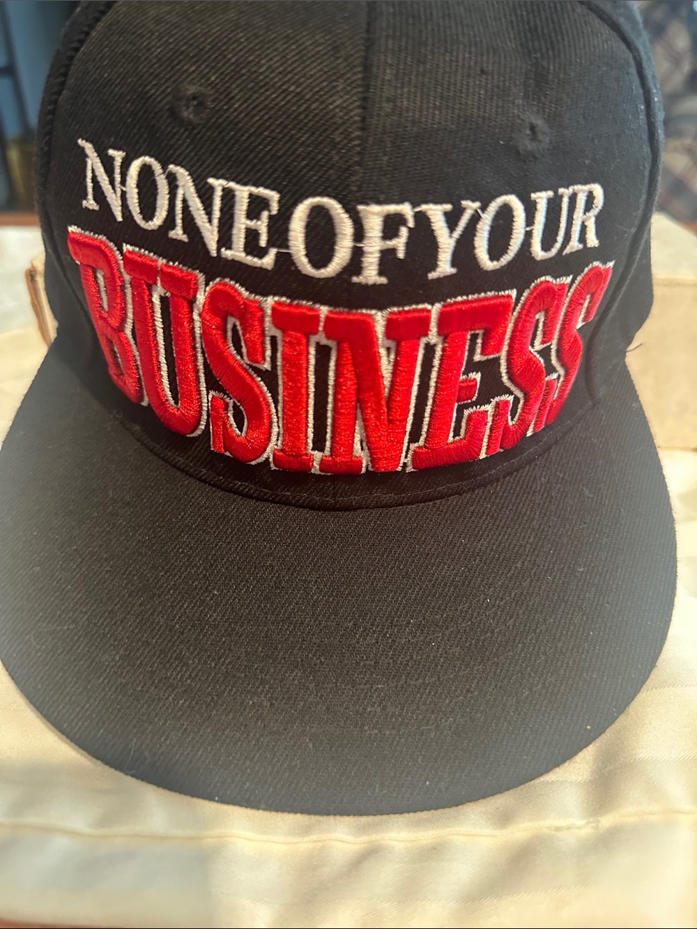 League Black Baseball Cap with White Text